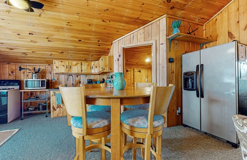 Gilford Cottage | Adorable cottage with a full kitchen, gas fireplace, pool, koi pond, & gazebo