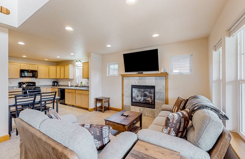Dover Bay House | Adorable, two-story home with a furnished front porch, fireplace, & washer/dryer