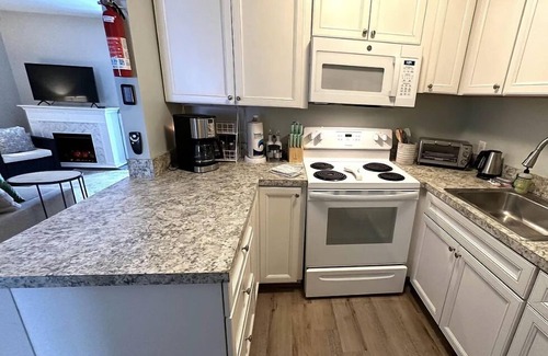 Weirs Beach Condo | Adorable, updated condo. Walk to Weirs Beach. Near Bank of N.H.Pavilion.