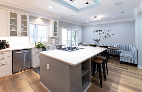 Austin House | Adventure & Relaxation Collide: Paddle Boards, Boat Lift, Lilypad & More