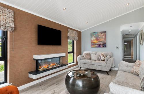 Penally House | Ael-Y-Bryn - Luxury Lodge, Hot Tub, Three En-Suite Bedrooms