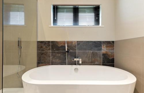 Penally House | Ael-Y-Bryn - Luxury Lodge, Hot Tub, Three En-Suite Bedrooms