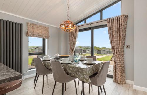 Penally House | Ael-Y-Bryn - Luxury Lodge, Hot Tub, Three En-Suite Bedrooms