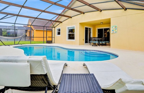 Lake Wilson Preserve House | Affable home with pool, lanai, grill, Pack-N-Play, & kitchen - snowbird-friendly