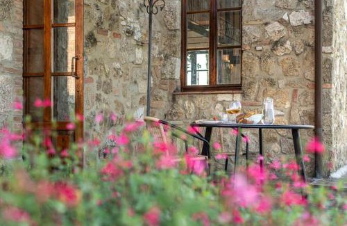 Asciano Apartment | AffittiBreviSiena - Palazzo Monaci Appartamento con piscina nelle crete Senesi