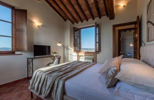 Asciano Apartment | AffittiBreviSiena - Palazzo Monaci Appartamento con piscina nelle crete Senesi