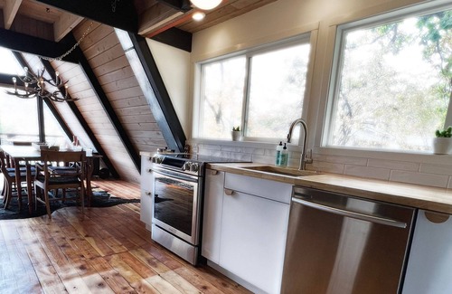 Camdenton Cabin | Aframe 34 ~ dock + lake front + hot tub + fire pit + great views