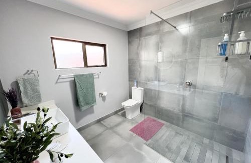 Pretoria House | Afrique134 Olive Tree Private Courtyard Suite