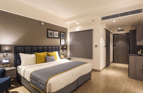 DLF City Hotel | AIR by Ahuja Residences