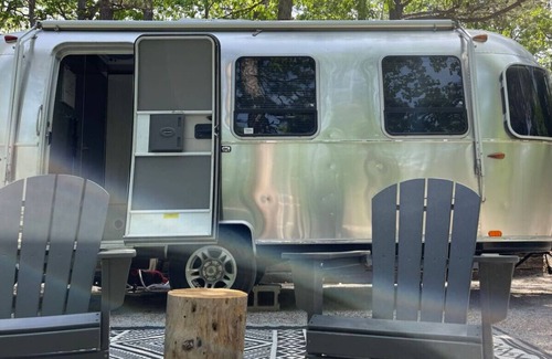 Eureka Springs RV Rental | Airstream Bambi with Hot Tub and outdoor kitchen