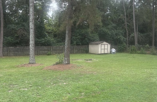 Bath House | Alex’s Legacy 3 bedroom Oasis with private pool and fenced in yard.