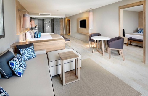 Downtown Cancun Resort | All inclusive mini suite and balcony at Grand Sirenis on the Riviera Maya