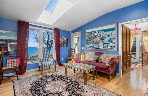 Sagamore Beach House | All the amenities of a vacation rental with colorful artwork, whimsical bedrooms and decor to match