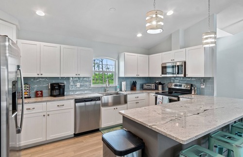 Pine Valley House | ALL the amenities! New home with hot tub, on canal, dock, everything you need!