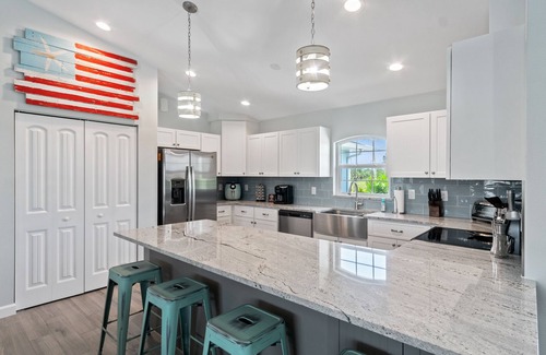 Pine Valley House | ALL the amenities! New home with hot tub, on canal, dock, everything you need!