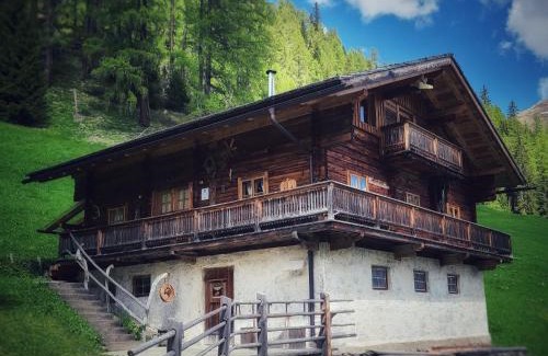 Innervillgraten Ski Chalet | Almhütte Oberschaller bei Alfenalm - Ferienwohnungen am Berg