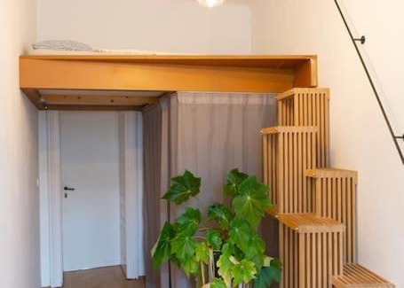 Reinprechtsdorf Apartment | Altbau-Designerwohnung mit Kamin
