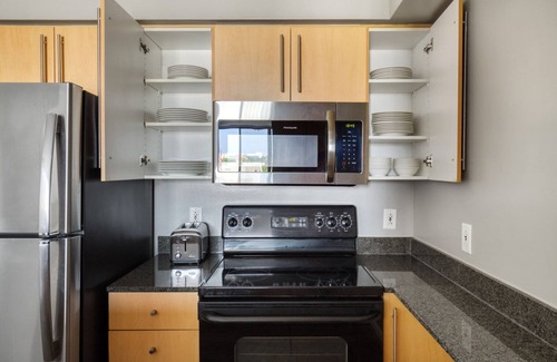 Woodmont Triangle Apartment | Amazing Bethesda 2BR w/Gym & Pool, near Metro, by Blueground