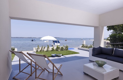 Vourvourou Villa | Amazing villa right on the beach feet in the water