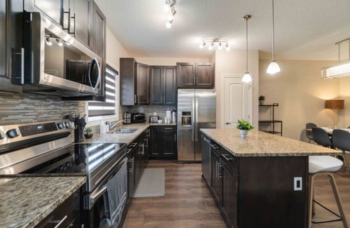 Southeast Edmonton House | Amongst Friends | Foosball | Pet Friendly | Garage