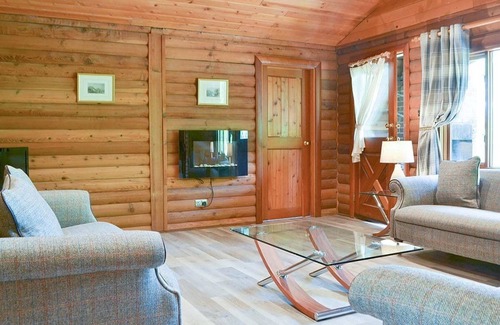 Portsonachan House | An Amazing Cedar 3 Bedroom Lodge On The Lochside at Portsonachan