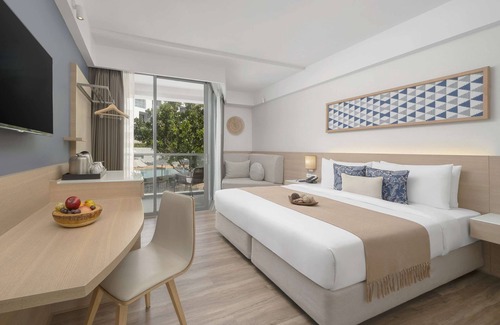 Patong Hotel | Andaman Beach Hotel Phuket - Handwritten Collection