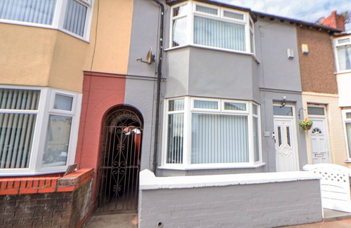 Liverpool Cottage | ANFIELD STADIUM HOUSE, pet friendly, with a garden in Liverpool