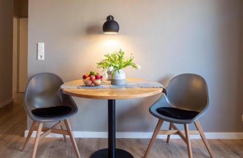 Spiekeroog Apartment | Antares Spiekerooger Gästehaus-Sonnengartenbalkon SüdWest - Wohnung 4