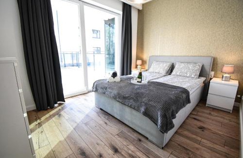 Ostroda Apartment | Apartament VILLA PARK przy plaży z widokiem na jezioro, taras 50 m2