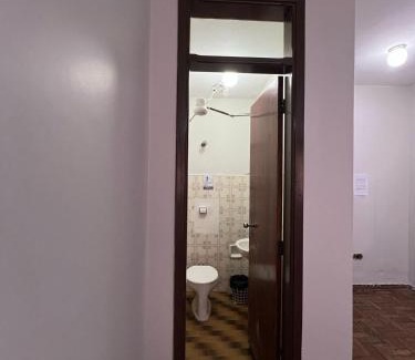 Patos de Minas Apartment | Apartamento 109 - Suíte econômica com ar condicionado
