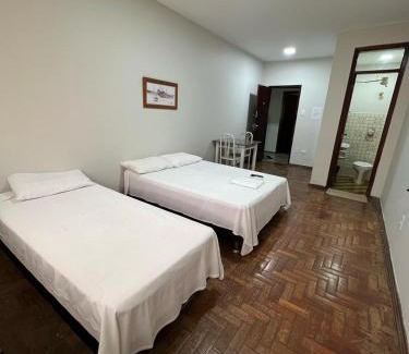 Patos de Minas Apartment | Apartamento 111 - Suíte econômica com ar condicionado