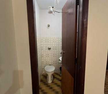 Patos de Minas Apartment | Apartamento 114 - Suíte em região central com ventilador