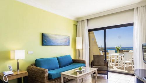 Tarajalillo Apartment | Apartamento 4 Estrellas con Vistas al Mar y Piscina en Bahía Feliz