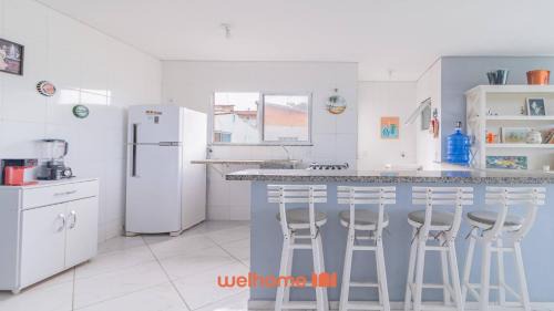 Morada da Praia Apartment | Apartamento em Bertioga com vista para o mar