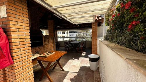 Morro do Maluf Apartment | Apartamento Frente a Praia de Pitangueiras garagem piscina e sauna