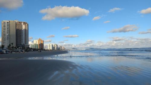 Caicara Apartment | Apartamento na Praia Grande II - Pé na Areia