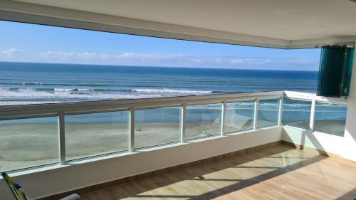 Jardim Real Apartment | Apartamento Praia Grande Novo Frente Mar Pé na Areia