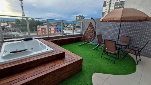 Capao da Canoa Apartment | Apartamento Sofisticado Ed Del Paine terraço com hidro