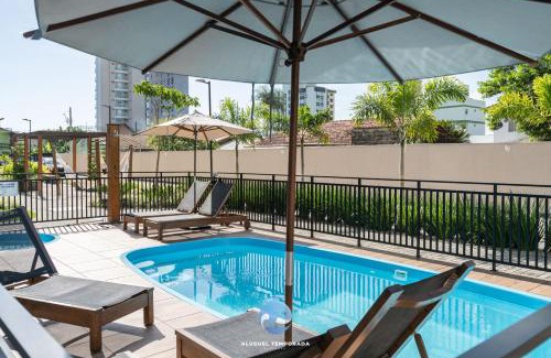 Picarras Apartment | Apartamentos em Bal Piçarras 150 M DA PRAIA com SACADA, WI-FI, PISCINA, PORTARIA 24h, PLAYGROUND e vaga de GARAGEM