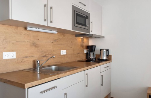 Immenstaad am Bodensee Apartment | Apartment 'A1 1 Obergeschoss Nummer 12' with Shared Terrace, Shared Garden and Wi-Fi