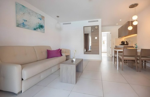Cala Agulla Apartment | Apartment '17' with Shared Pool, Wi-Fi and Air Conditioning