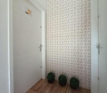 Passo de Torres Apartment | Apartment 2 blocks from the sea with parking and Wi-Fi