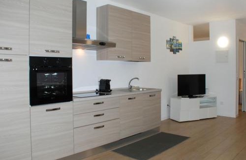 Bissone Apartment | Apartment Charming Gardenview App- 102 by Interhome