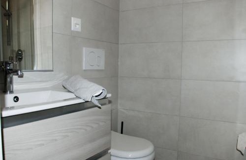 Bissone Apartment | Apartment Charming Gardenview App- 102 by Interhome