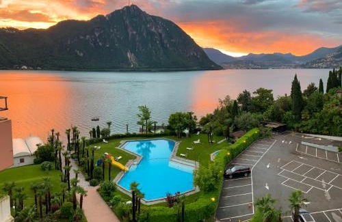 Bissone Apartment | Apartment Charming Gardenview App- 102 by Interhome
