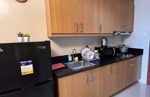 Pasay Apartment | Apartment hotel in front of biggest mall of asia with resort type amenity pool.
