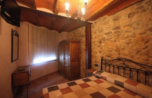 Pauls House | Apartment In A Hotel 'Casa Rural Cal Puyo' with Mountain View, Wi-Fi and Air Conditioning