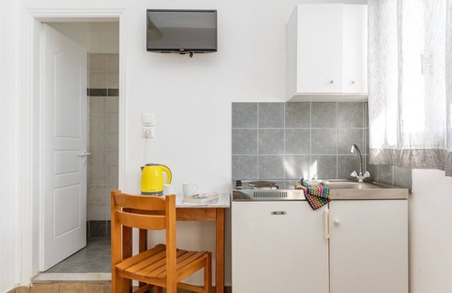 Paros Apartment | Apartment In A Hotel 'Livadia Studio A Paros' with Sea View, Wi-Fi and Air Conditioning