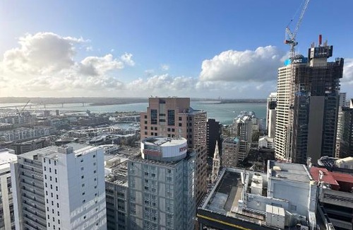 Auckland Central Business District Apartment | Apartment in Auckland City in Front of Sky Tower