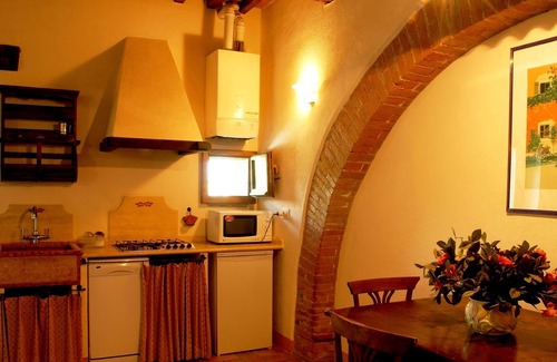 Radicofani Apartment | Apartment in old farmhouse with garden and swimming pool